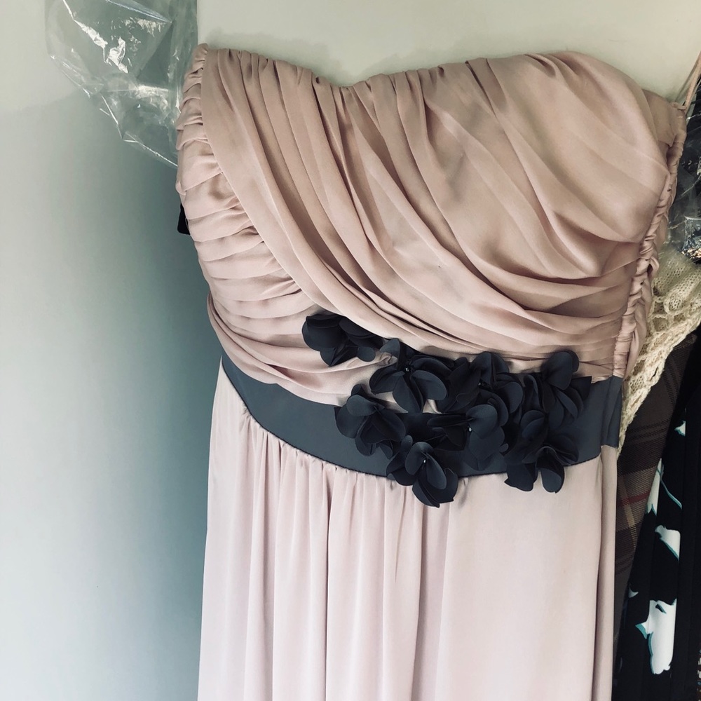 Dress size has been altered to fit a 6